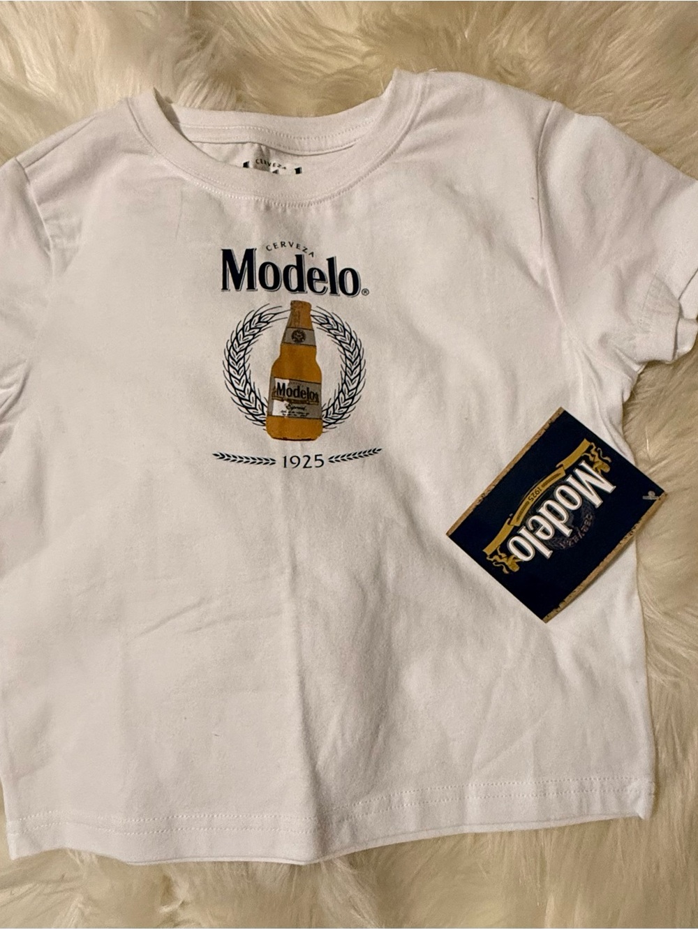 Modelo White Tee with Gold Bottle Graphic
